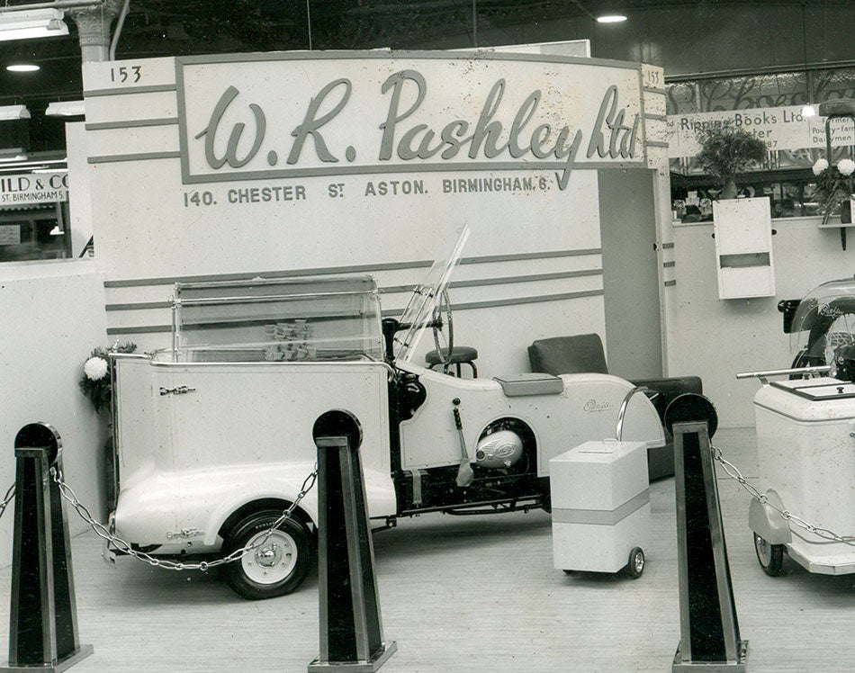 A retro exhibition cycle show stand featuring the Pashley Supieror.