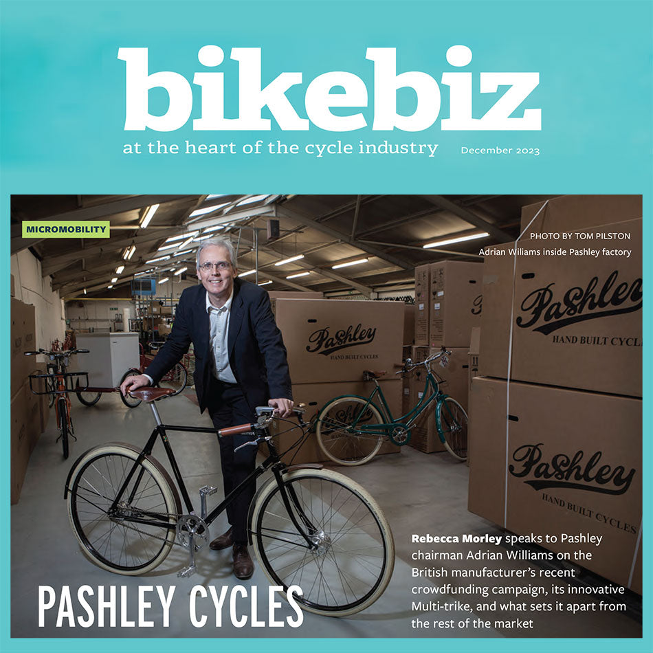 Bikebiz logo with image of Adrian Williams - Pashley Chairman - below standing with classic Guv'nor bike.