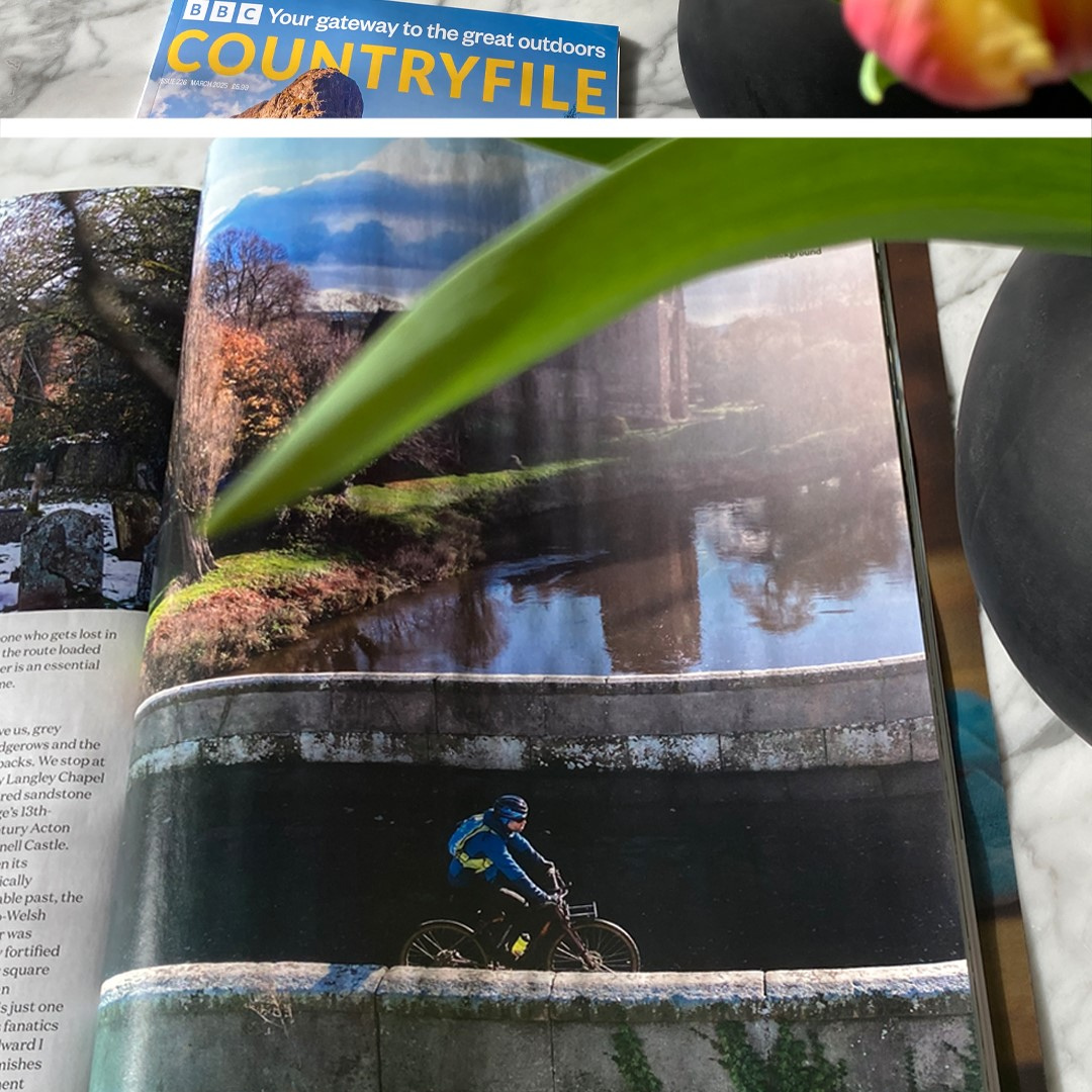 Open copy of BBC Countryfile magazine, showing a photo of a Pashley ebike being ridden