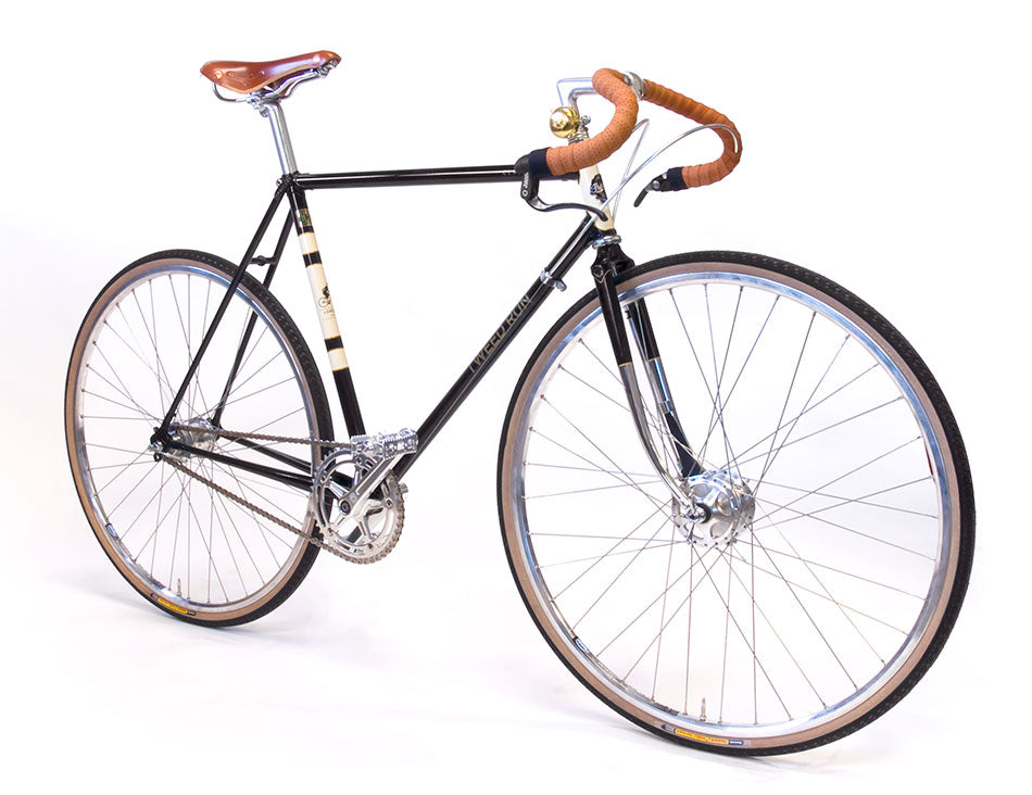 A Pashley Clubman road bike in black with leather saddle, leather bar tape and seat tube stripes.