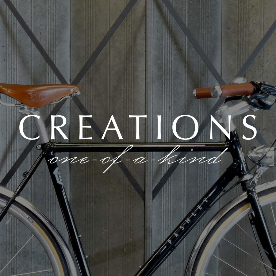 Pashley Creations logo overlay on close-up of black city bike