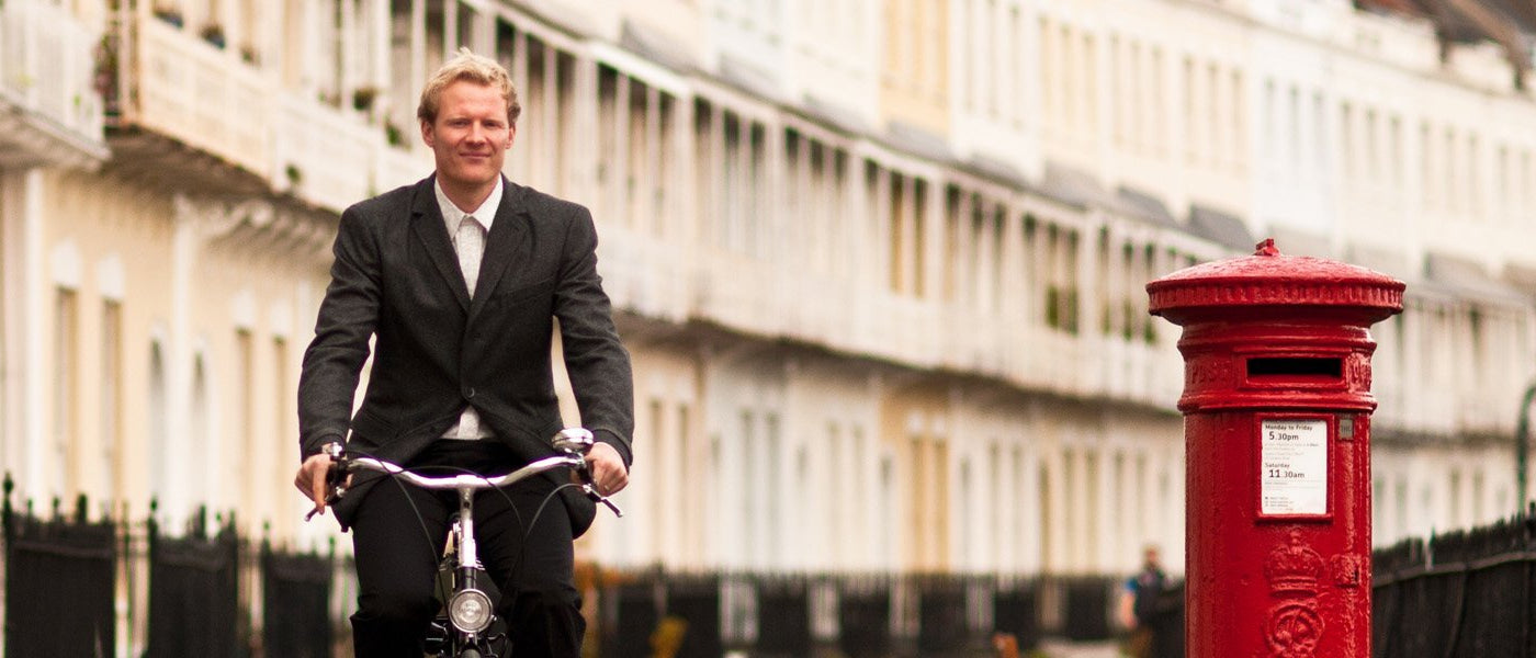 Gentleman wearing a Pashley Blazer riding a Roadster Bicycle in Bristol.