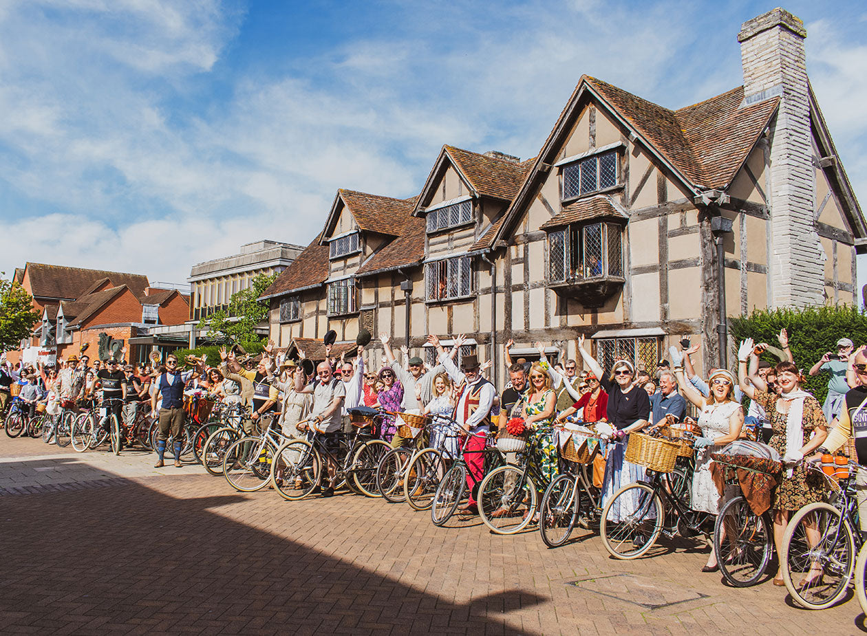 Pashley riders on the standing together with their bicycles outside Shakepeare's birthplace in Stratford-upon-Avon.