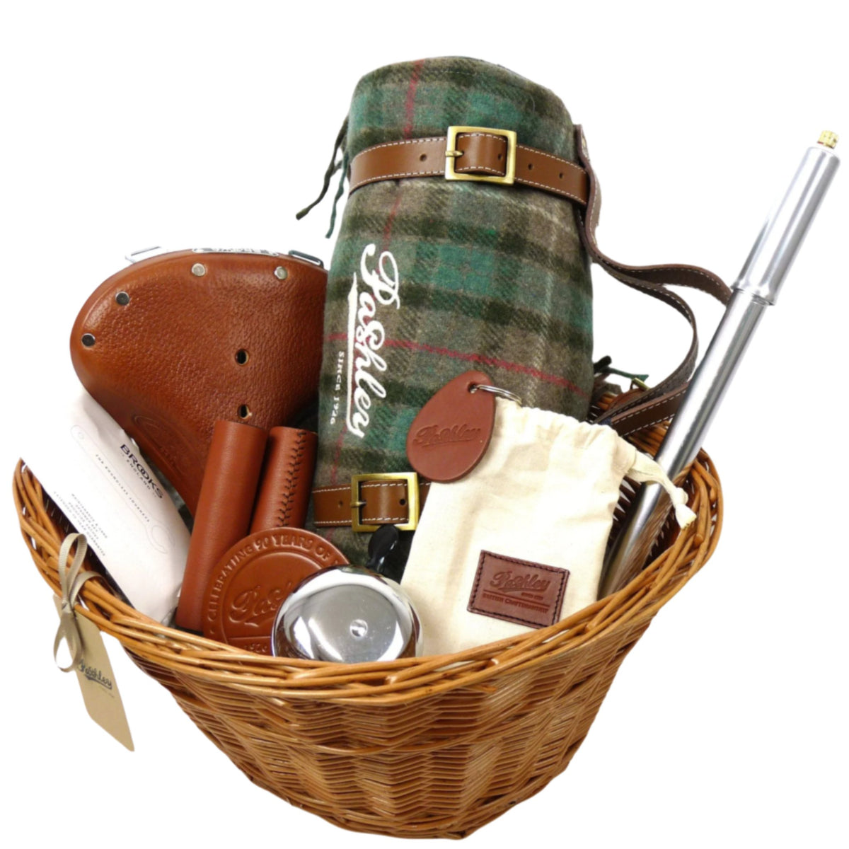 A wicker basket with Pashley gifts inside