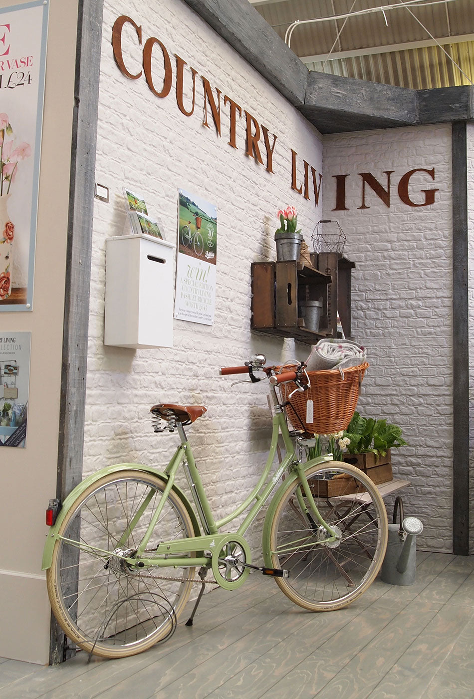 The Country Living Special Edition meadow green Pashley Bike with wicker basket, on display at the 2015 CL fair in Earl's Court.