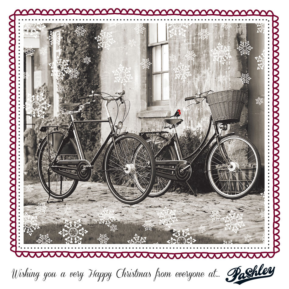 2014 Pashley Christmas card featuring the Roadster and Sovereign bicycles with falling snowflakes.