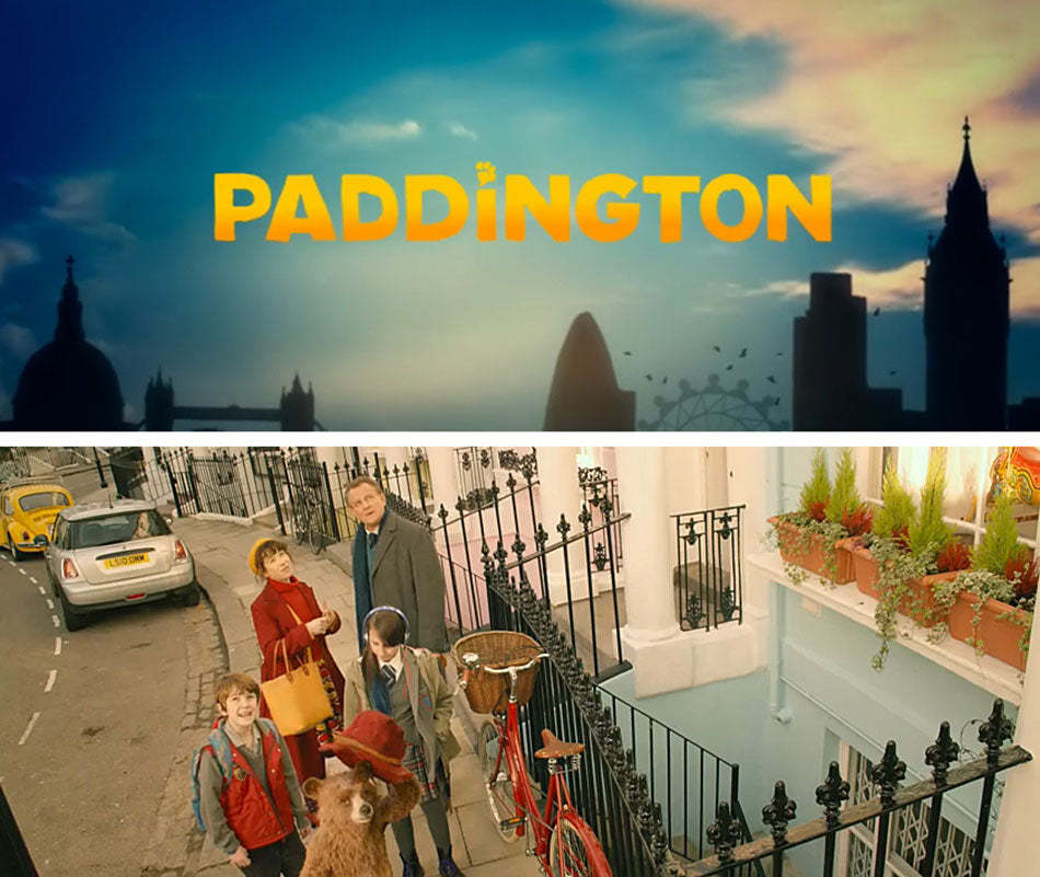 Paddington Movie screen shot of the Brown family on a street in London next to a Pashley Britannia bicycle in red.