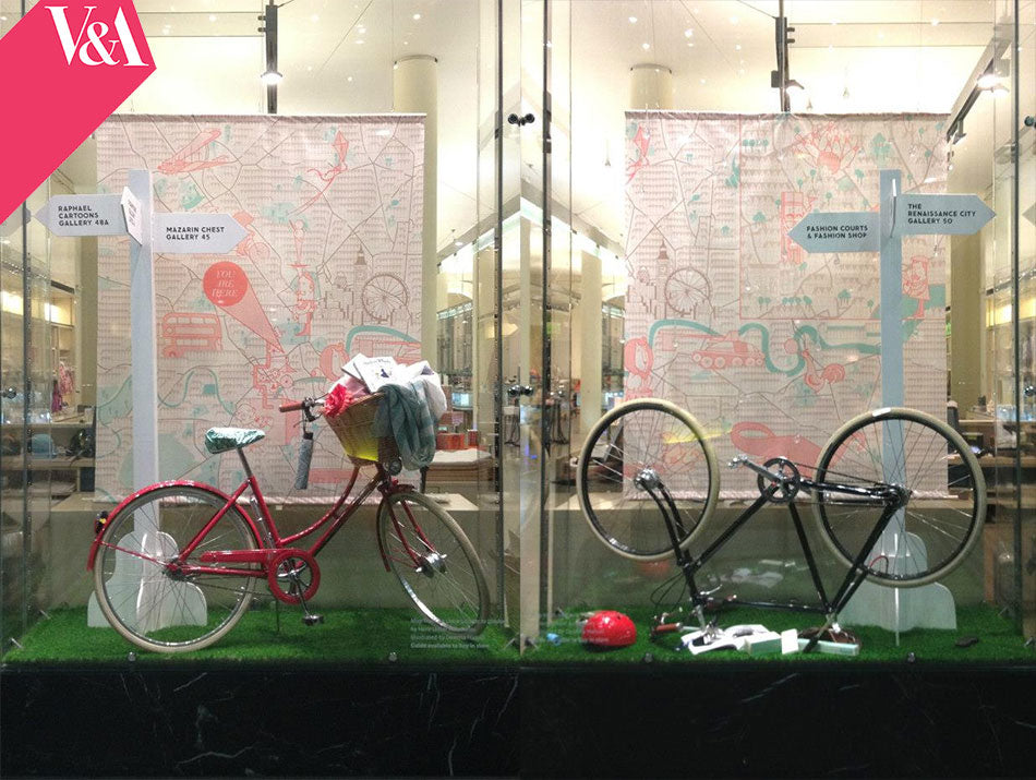 A Pashley Britannia in Red and a Guv'nor bicycle in a window display at the V and A museum in London.