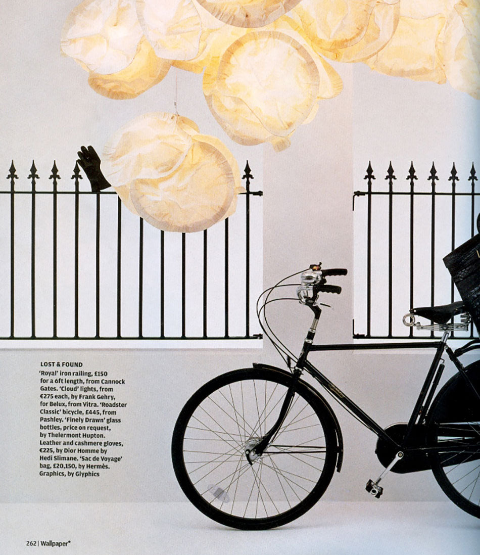 Image of the Wallpaper magazine article featuring a black Pashley Roadster bicycle next to pretend railings