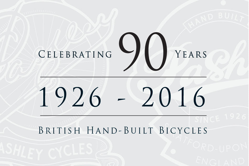 Pashley 90th anniversary poster featuring the 1920s Pashley head badge alongside today's head badge.