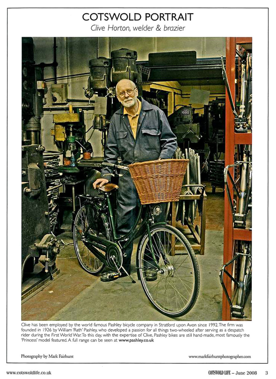 Pashley brazer standing with Princess Sovereign bicycle inside the Pashley bicycle factory