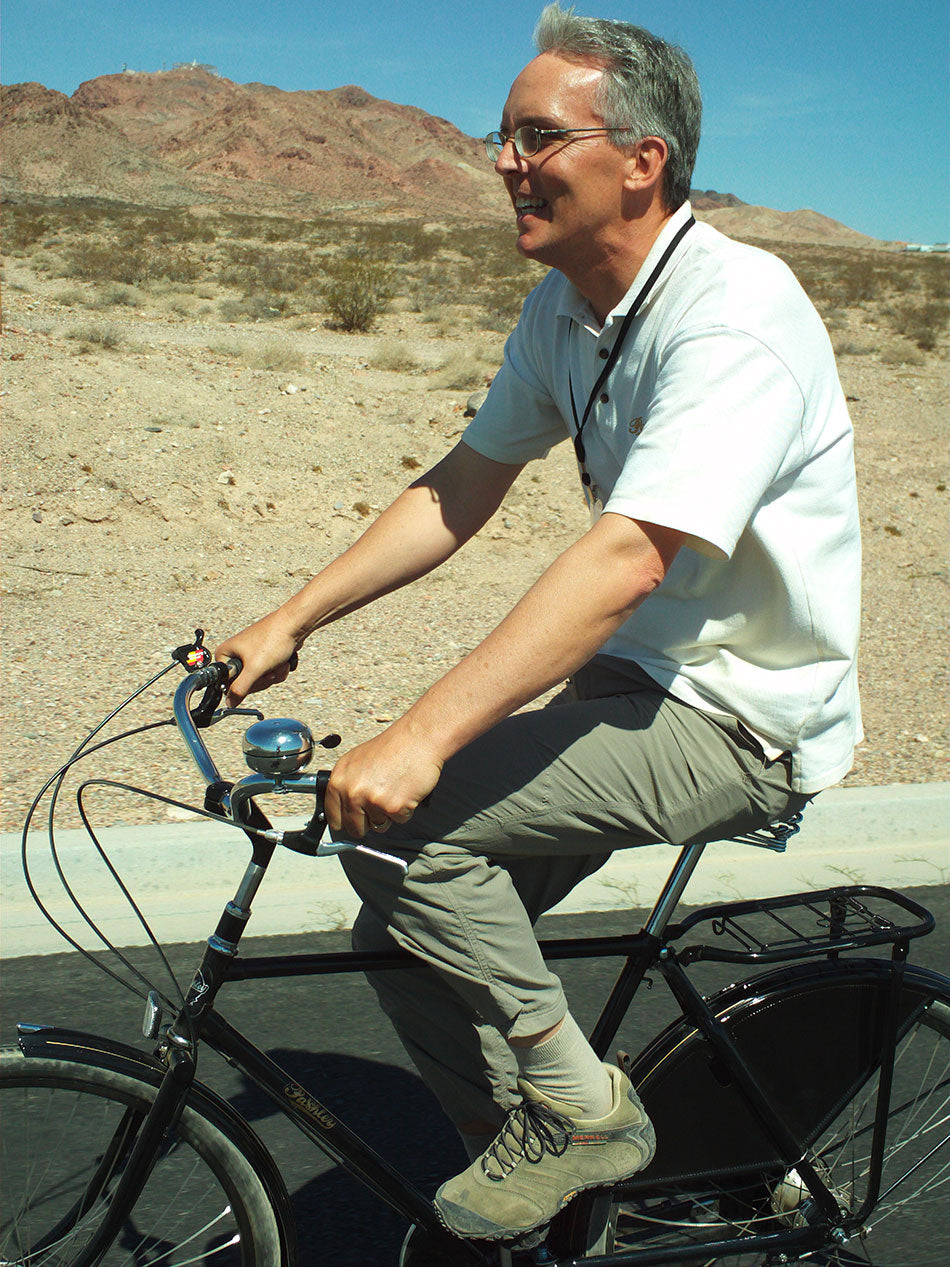 Pashley Cycle's Managing Director, Adrian Williams, riding a Roadster bicycle in Boulder City Nevada.