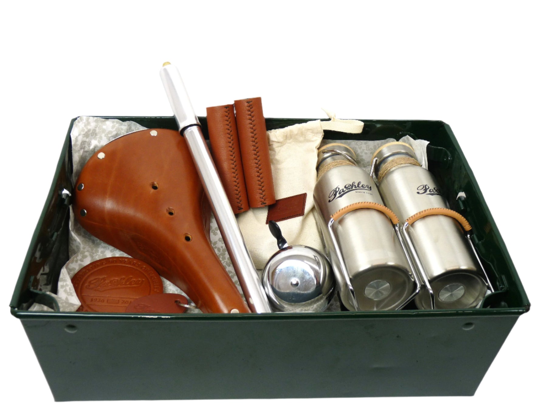 A green steel tray with gifts inside