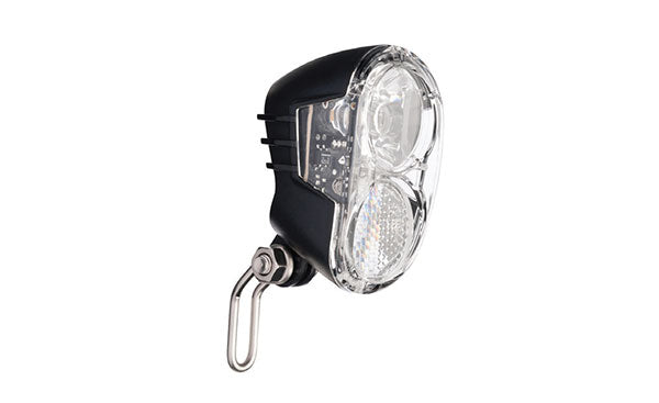 Angled view of a front bicycle headlight with mounting bracket