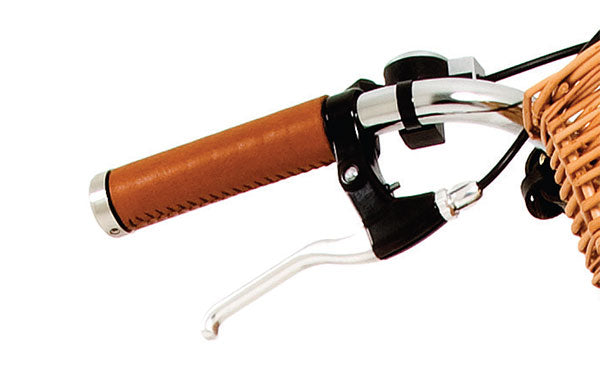 Traditional leather handlebar grip in a saddle brown colour.