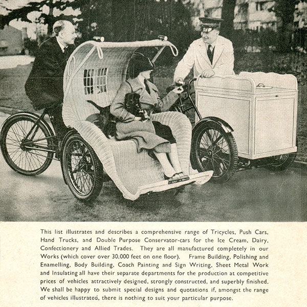 An original Bath Chair tricycle with wicker seat for carrying people