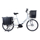 Pashley electric carg obike with large front and rear cargo boxes and tripod propstand.